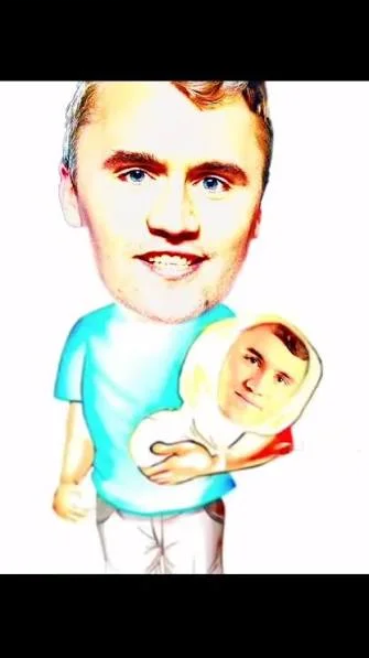 A man holding a baby in his arms