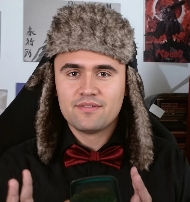 A man in a fur hat holding a cell