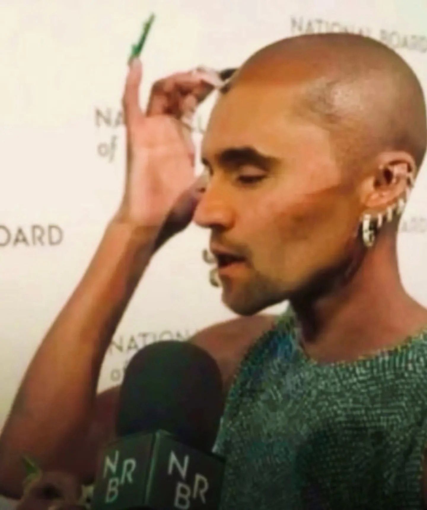 A man with a microphone and a microphone