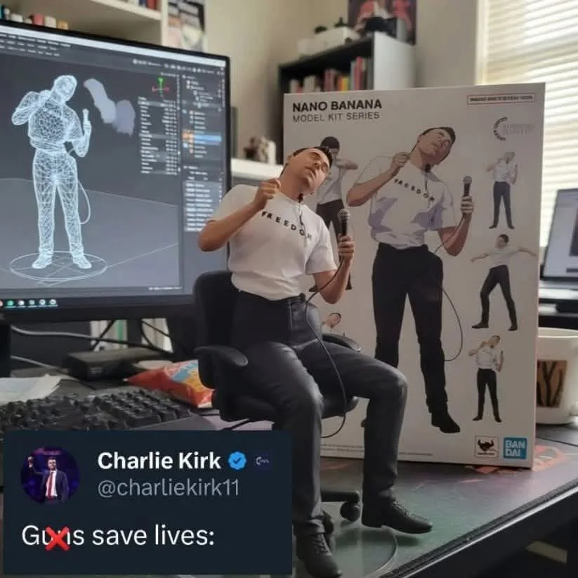 A man sitting on a desk with a computer