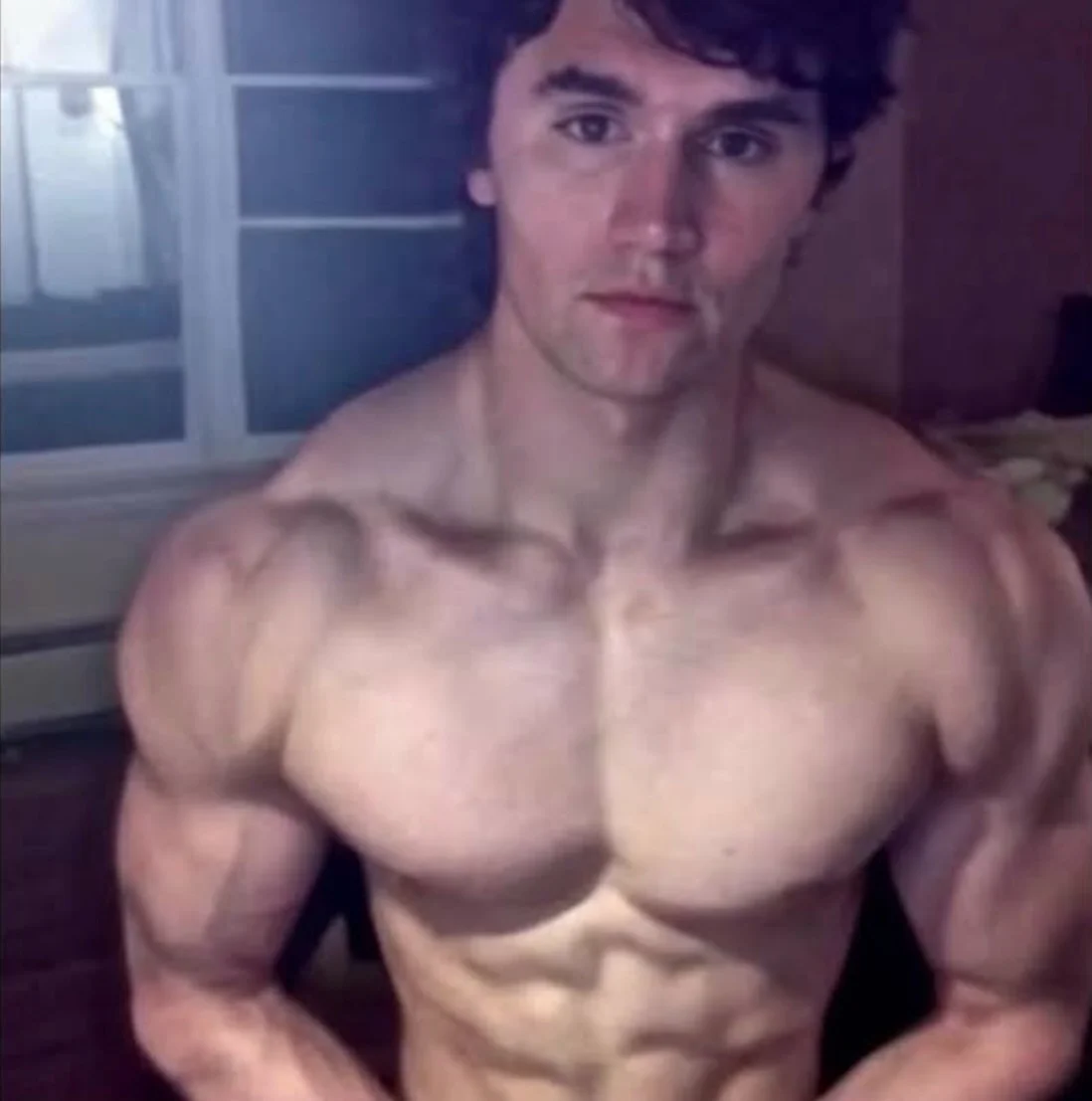 A man with a muscular body and no shirt