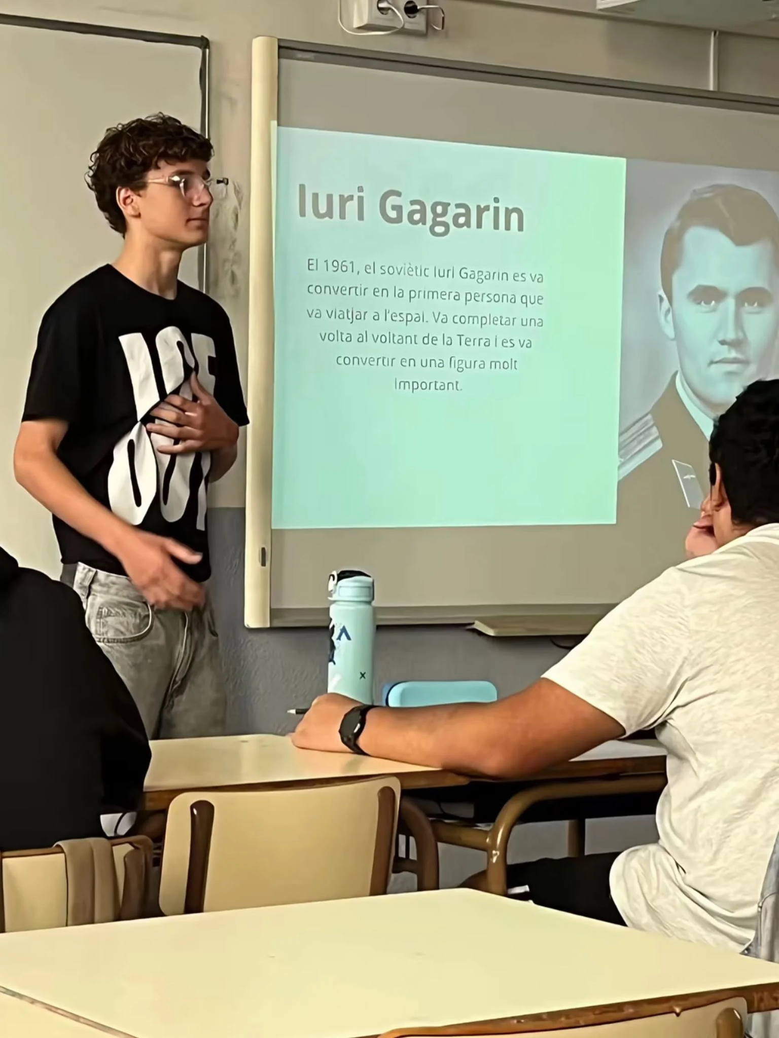 A man standing in front of a whiteboard