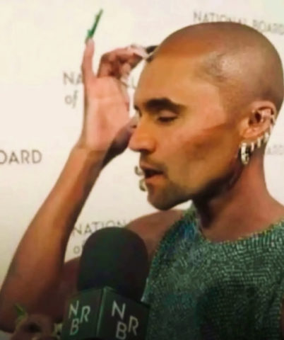 A man with a microphone and a microphone